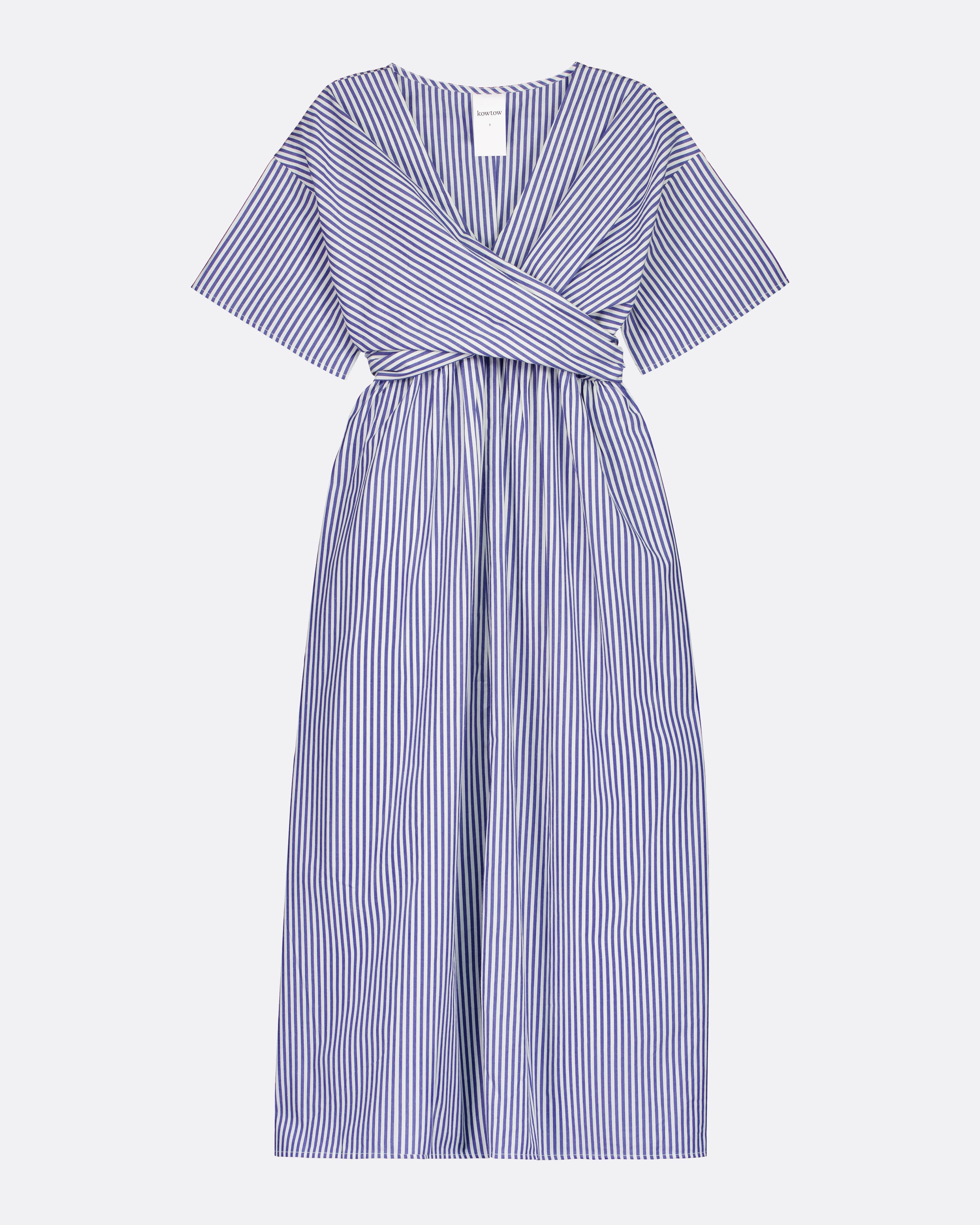A blue and white vertically striped midi dress with a wrap-style V-neck, short sleeves, and a self-tie waist belt, shown against a light gray background.