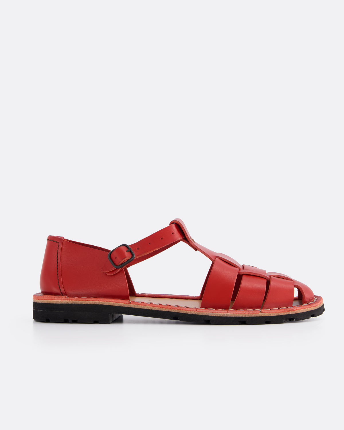 A red leather strappy sandal with a buckle strap and open toe, shown from a side profile on a light gray background.