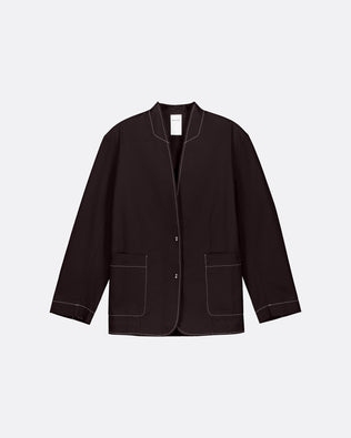A dark brown blazer with white contrast stitching, featuring a stand collar, button front, and two front patch pockets, displayed on a light gray background.