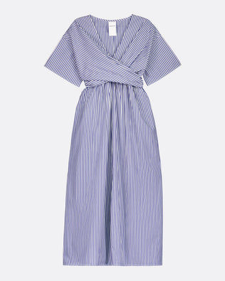 A blue and white vertically striped midi dress with a wrap-style V-neck, short sleeves, and a self-tie waist belt, shown against a light gray background.