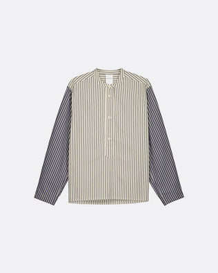 A long-sleeve button-up shirt with a beige and white vertically striped body and solid dark gray sleeves, displayed flat against a light gray background.