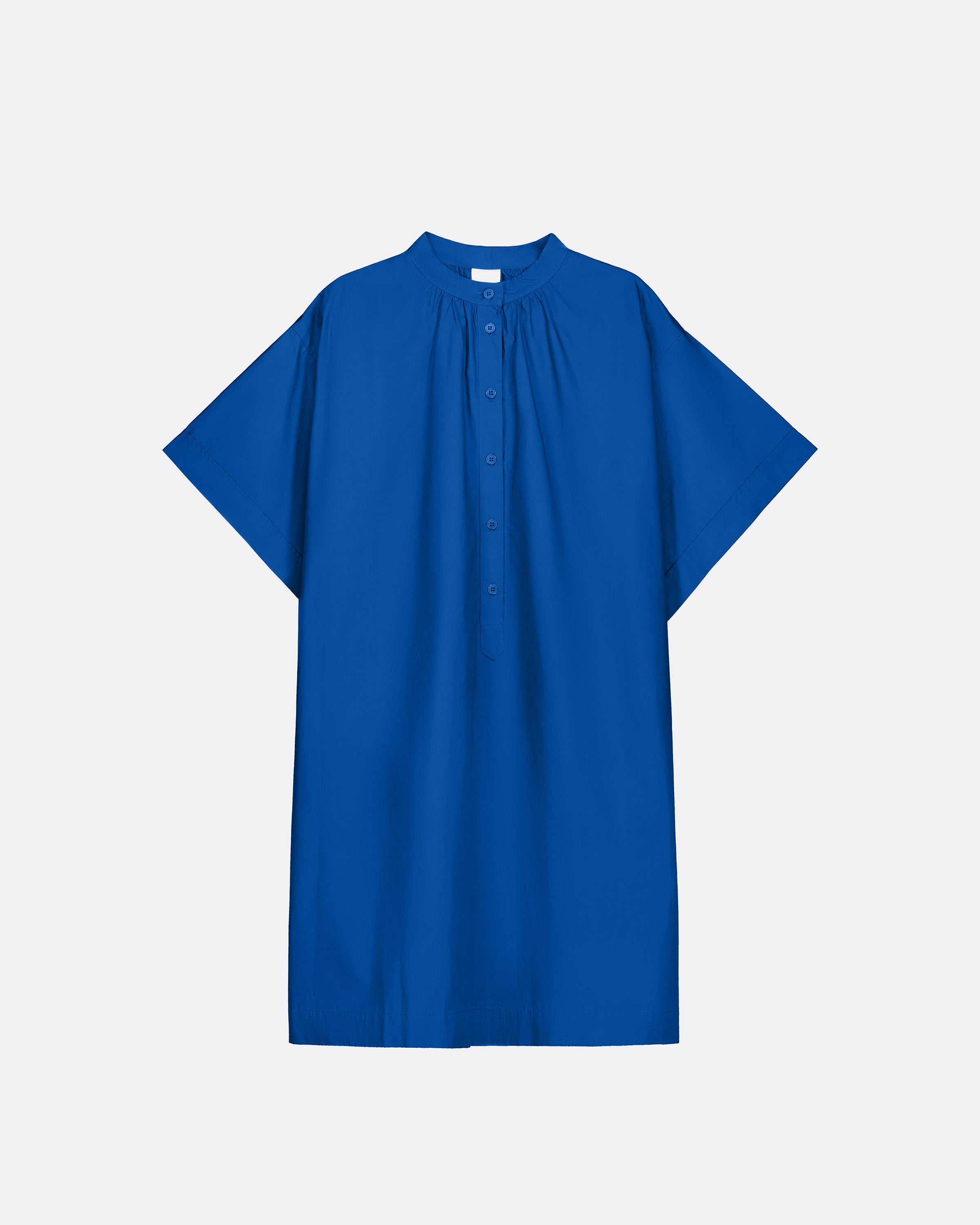 A royal blue short-sleeve blouse with a high gathered neckline and a button placket.