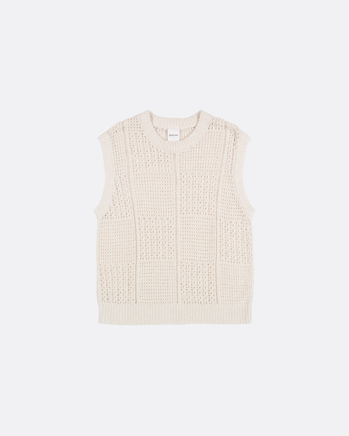 A sleeveless cream-colored knit vest with a textured openwork pattern, shown flat against a light gray background.